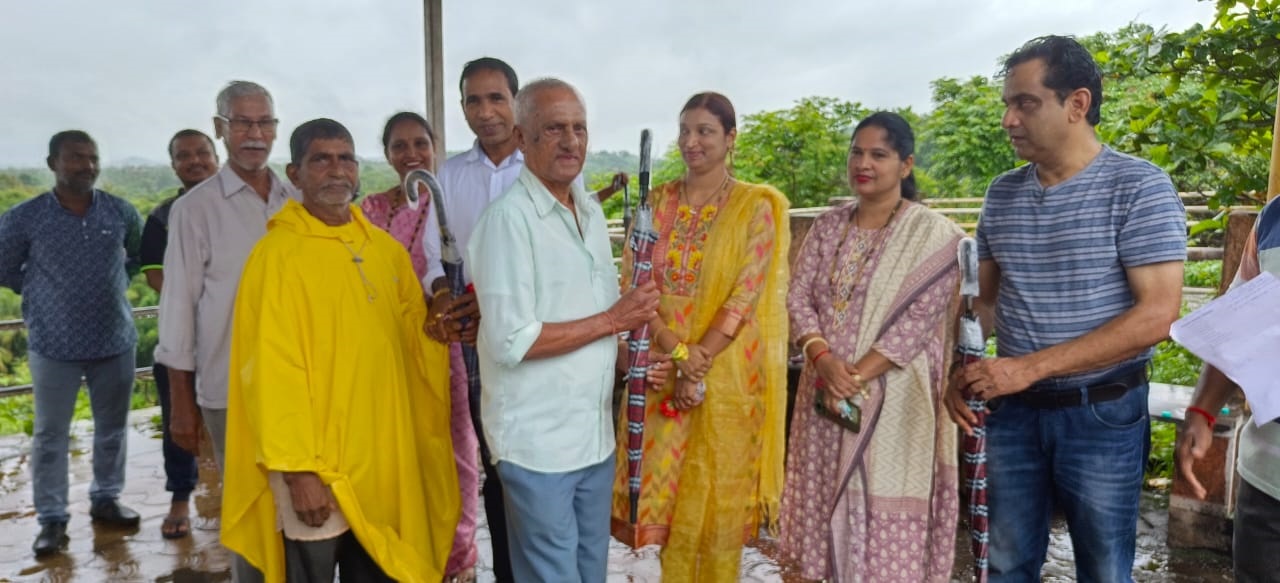 Senior citizens receive free umbrellas in Sanvordem