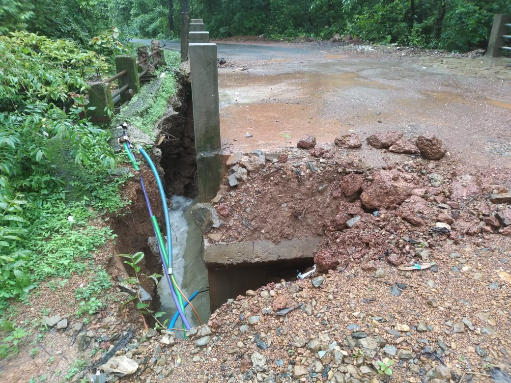 Approach road, retaining wall of culvert bridge caves in at Cotigao