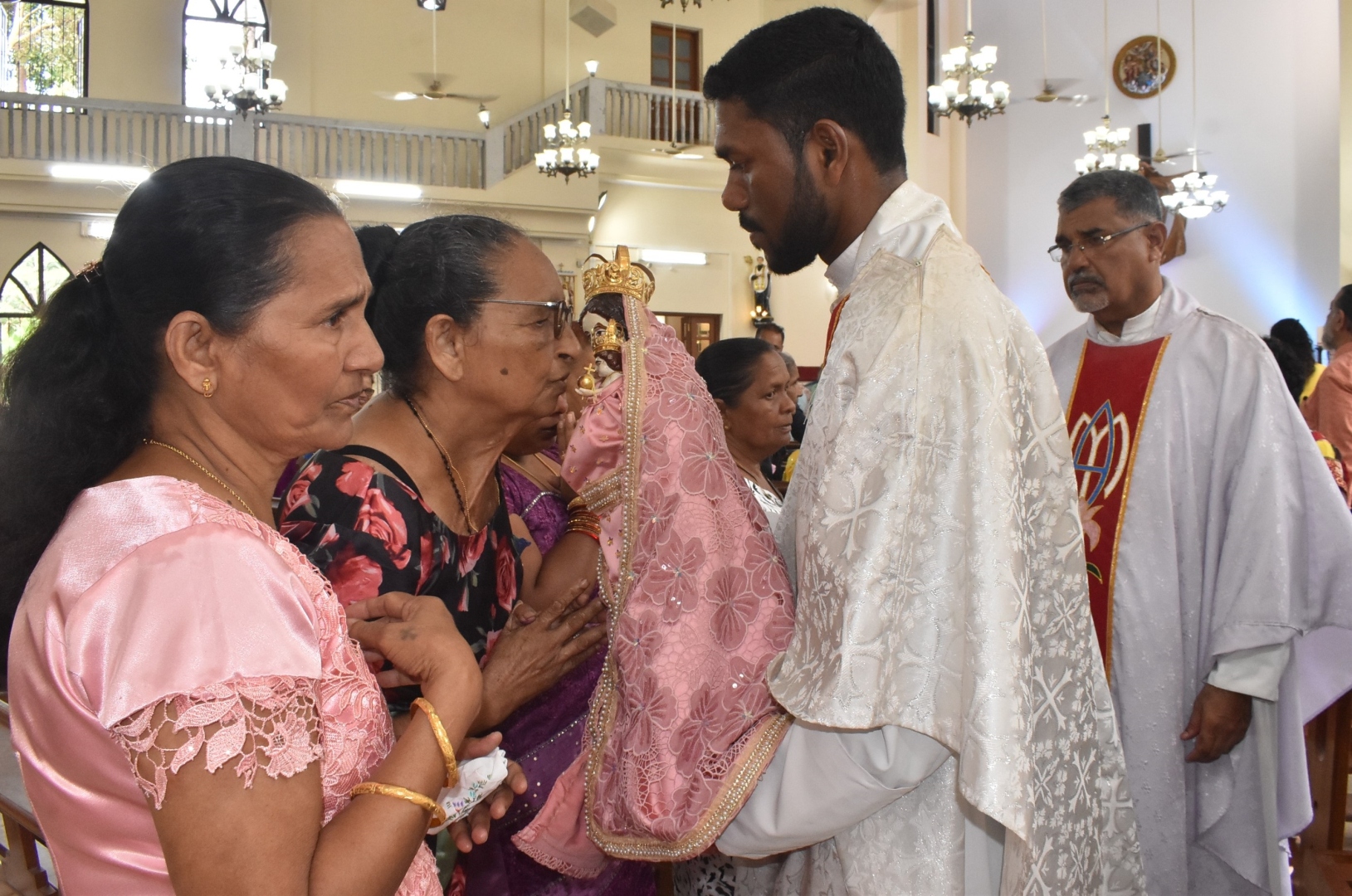 Devotees venerate Our Lady’s statue in Benaulim