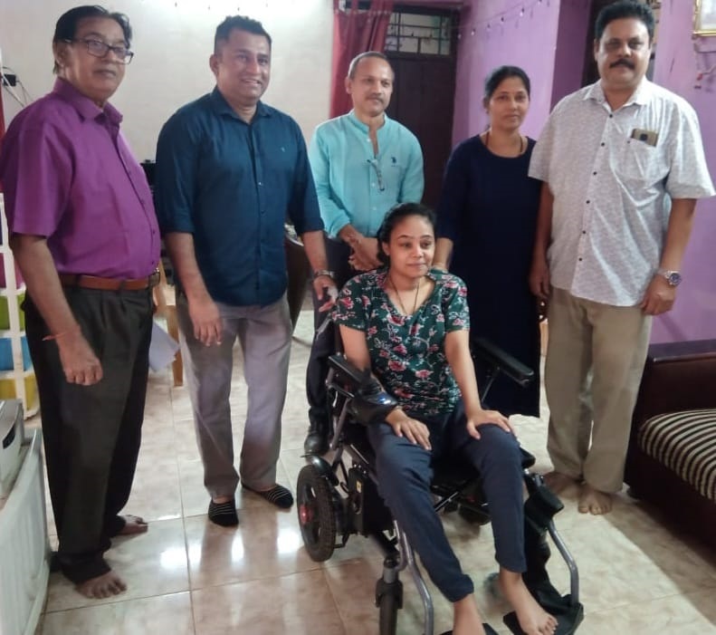 Disability Commission gifts woman motorized wheelchair