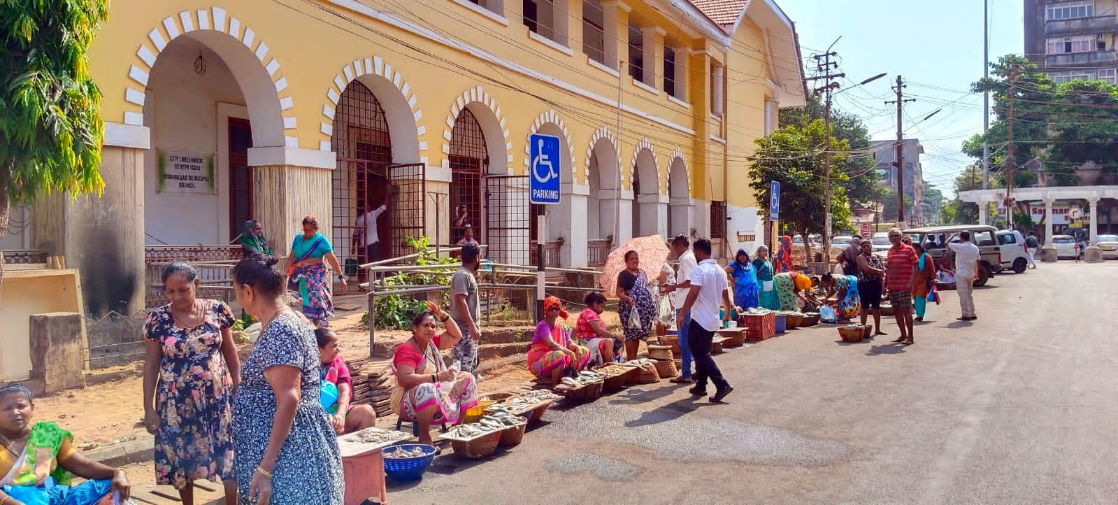 Vasco fish market vendors protest by   selling fish outside council building